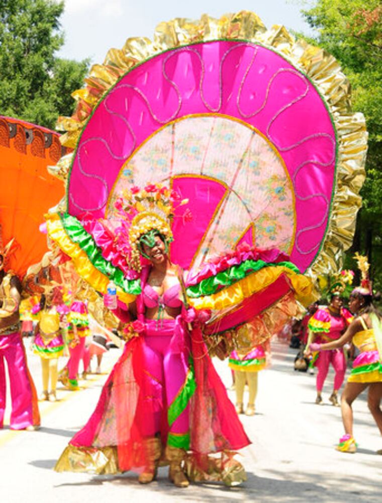 Colorful Caribbean Festival parade dazzles the day