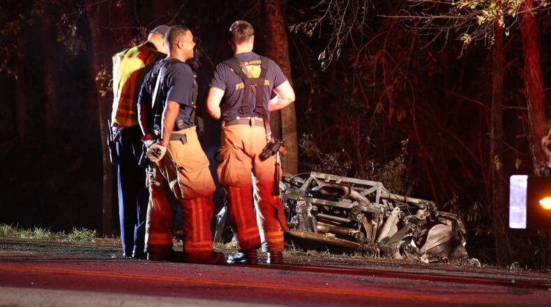 Authorities were investigating at the scene of a fatal Lamborghini crash in DeKalb County on Friday, Sept. 18, 2015. (BEN GRAY / BGRAY@AJC.COM)
