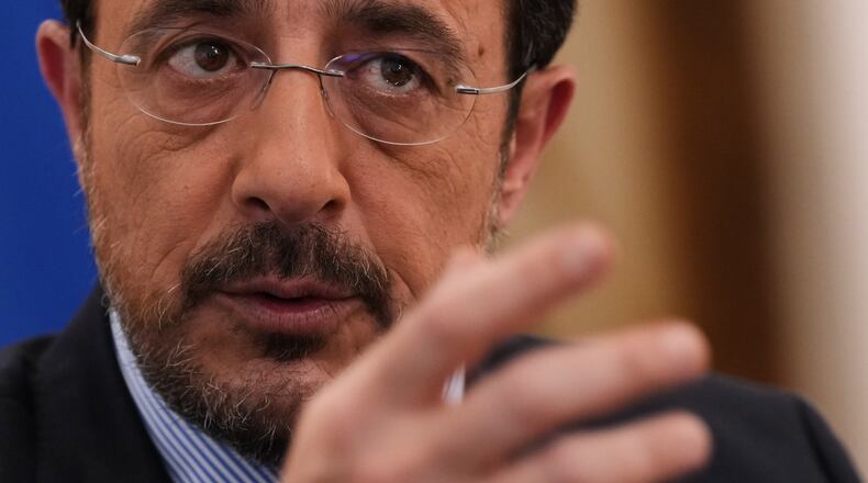 Cypriot President Nikos Christodoulides gestures as he speaks during an Associated Press interview ahead of this week's major EU-Middle East summit, at the presidential palace in the capital Nicosia, Cyprus, Tuesday, April 21, 2026. (AP Photo/Petros Karadjias)