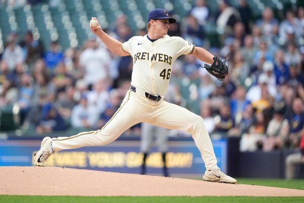 Milwaukee Brewers' Quinn Priester pitches during the first inning of a baseball game against the Atlanta Braves, Tuesday, June 10, 2025, in Milwaukee. (AP Photo/Aaron Gash)