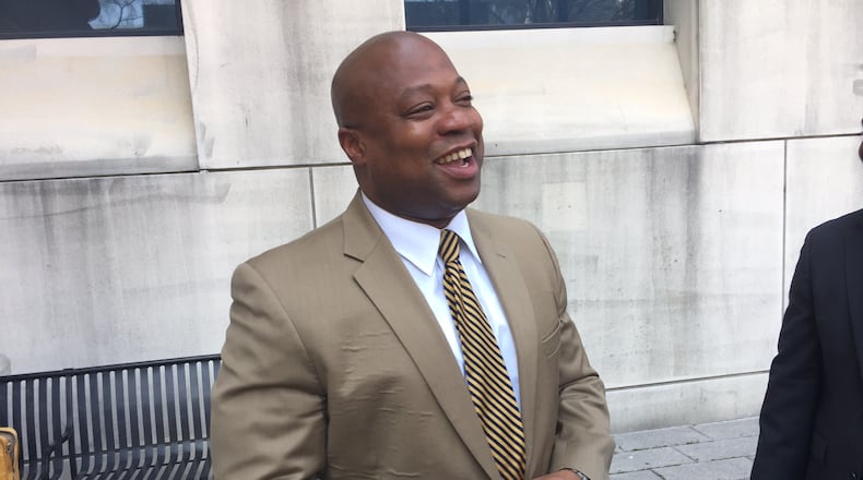 Odis Williams, attorney for E.R. Mitchell, speaks with reporters after divorce hearing on Tuesday. PHOTO: LEON STAFFORD/AJC
