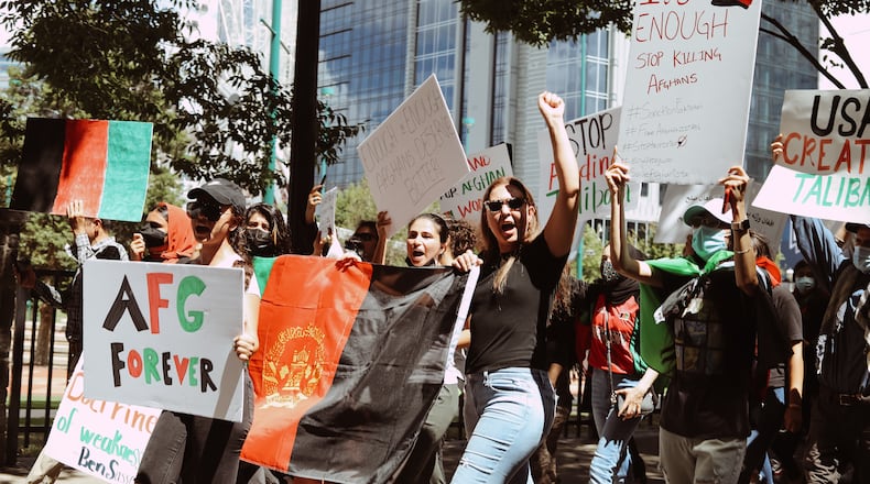 A group of demonstrators gathered in downtown Atlanta on Saturday, Aug. 15, 2021, to bring attention to the situation in Afghanistan.
