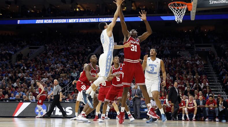 This was the rare non-3-point shot by Marcus Paige. (AP Photo/Matt Rourke) North Carolina's Marcus Paige, left, releases a shot against Indiana's Thomas Bryant during the first half of an NCAA college basketball game in the regional semifinals of the men's NCAA Tournament, Friday, March 25, 2016, in Philadelphia. (AP Photo/Matt Rourke)