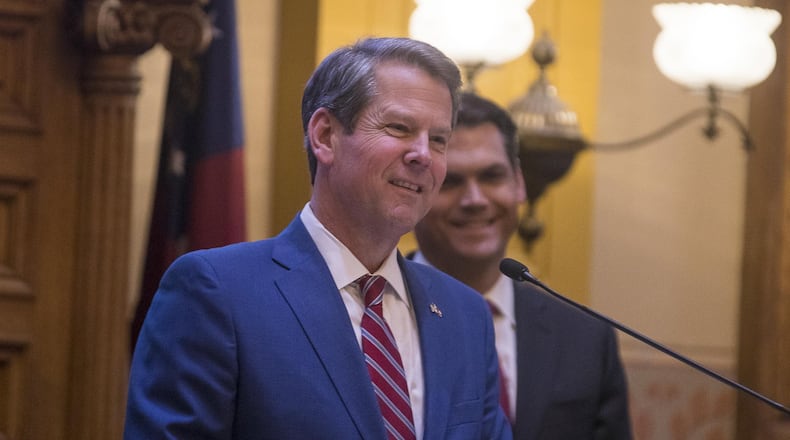 Lt. Gov. Geoff Duncan looks on as Gov. Brian Kemp speaks to members of the Senate in the chambers during Sine Die, the last day of the 2019 Georgia General Assembly, at the state Capitol in Atlanta on April 2, 2019.