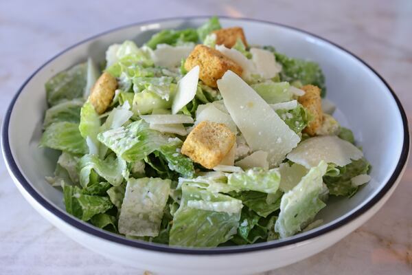 A crisp Caesar salad at Baraonda Ristorante & Bar is coated generously with an anchovy-forward dressing. Natrice Miller/natrice.miller@ajc.com