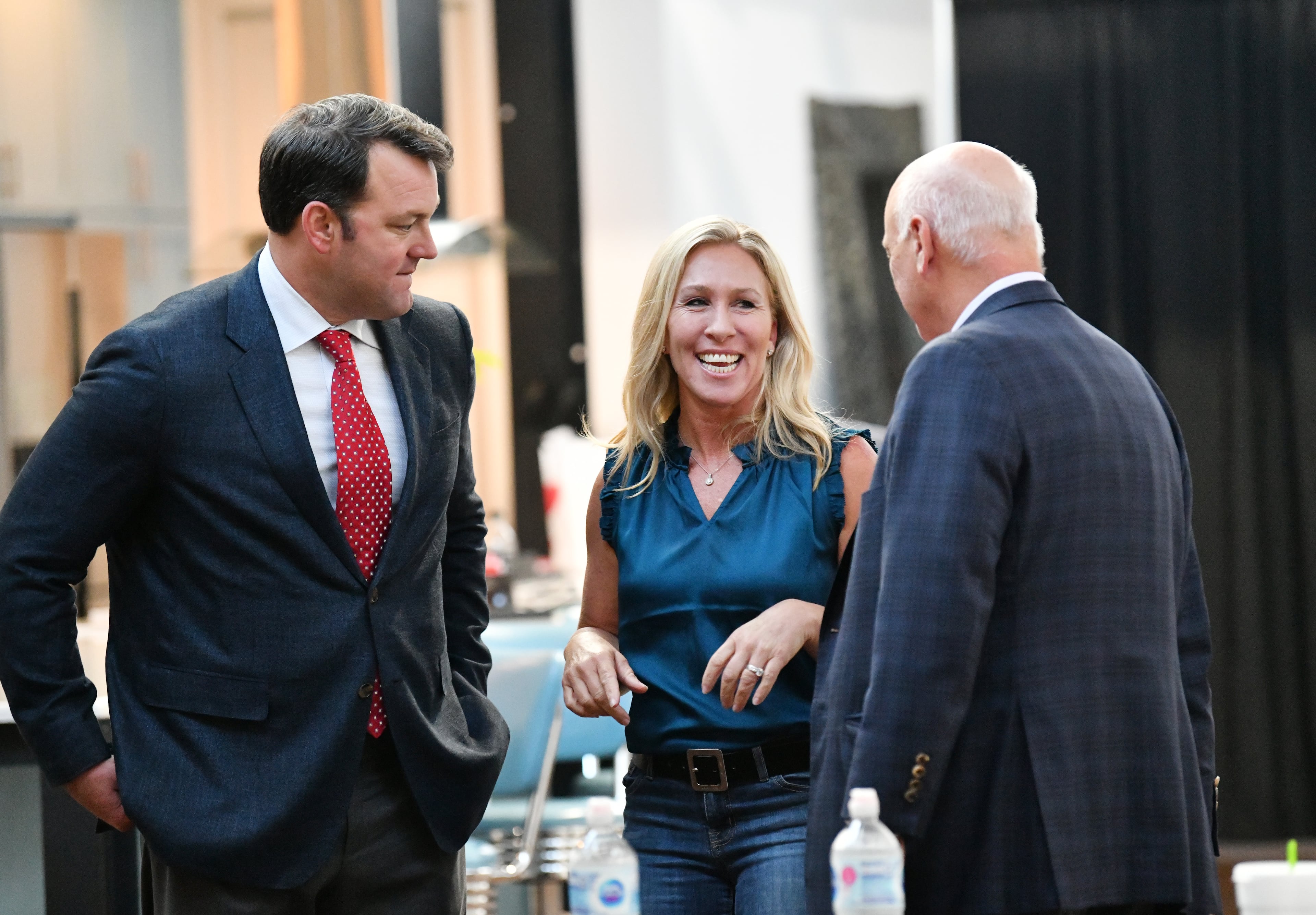 July 13, 2021 Rome - U.S. Rep. Marjorie Taylor Greene (center) speaks with State Senators Burt Jones (left) and Brandon Beach during Ò2020 Election Integrity TownhallÓ meeting at The Lewis Loft in Rome on Tuesday, July 13, 2021. (Hyosub Shin / Hyosub.Shin@ajc.com)