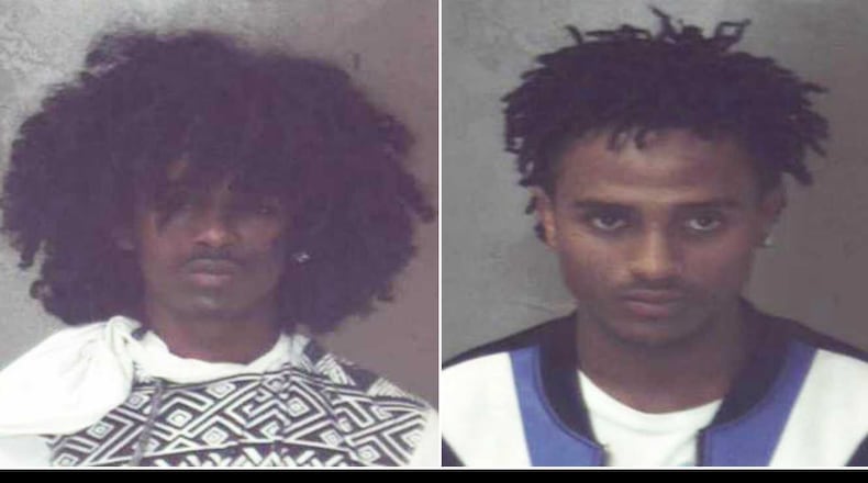 Kibrom Gebre, 17, left, and Binyam Melese, 18, are accused of a murder at a notorious DeKalb County apartment complex.