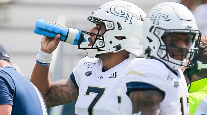 Georgia Tech quarterback Lucas Johnson hydrates during the Yellow Jackets' 14-10 win over South Florida at Bobby Dodd Stadium September 7, 2019. (AJC photo by Alyssa Pointer)