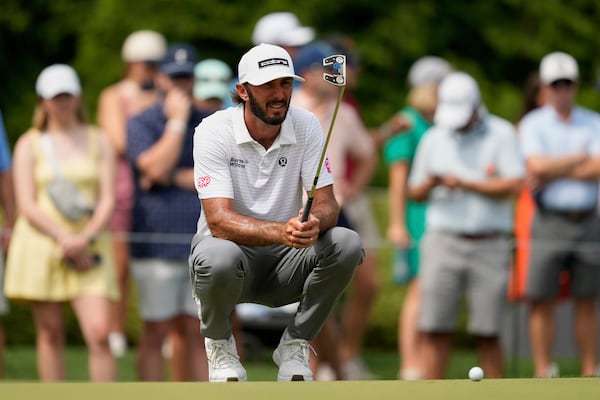 Max Homa lines up a putt on the fifth hole during the second round of the PGA Championship golf tournament at the Quail Hollow Club, Friday, May 16, 2025, in Charlotte, N.C. (AP Photo/Matt York)