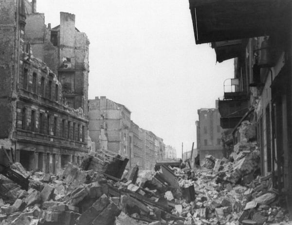 FILE - Wreckage and debris fill Frankfurter Allee near Lasdehner Strasse in a working district in the eastern section of Berlin on July 31, 1945, following an allied aerial attack on Feb. 26, 1945, prior to the fall of the city. (AP Photo, File)