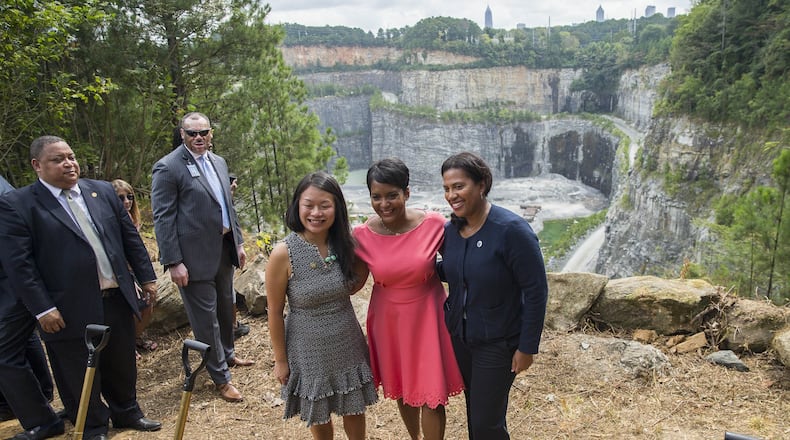 09/06/2018 — Atlanta, Georgia — Atlanta Mayor Keisha Lance-Bottoms (center), former Atlanta Parks and Recreation commissioner Amy Phuong (left) and Atlanta Department of Watershed Management Commissioner Kishia Powell (right) poses for a photograph following the ground breaking ceremony for the new Westside Park at the Bellwood Quarry in Atlanta, Thursday, September 6, 2018. The park, planned for years as both a recreational center and reservoir for drinking water, has been seen as a potential catalyst for redevelopment of the city’s northwest side. (ALYSSA POINTER/ALYSSA.POINTER@AJC.COM)