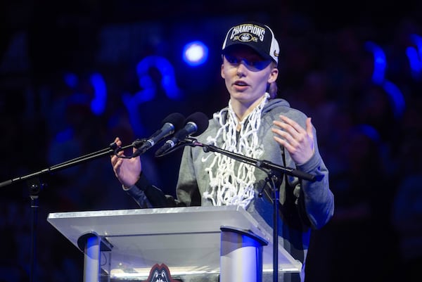 UConn's Paige Bueckers speaks to fans during an NCAA college basketball "Championship Welcome Home Rally" for the team Monday, April 7, 2025, Storrs, Conn. (Aaron Flaum/Hartford Courant via AP)