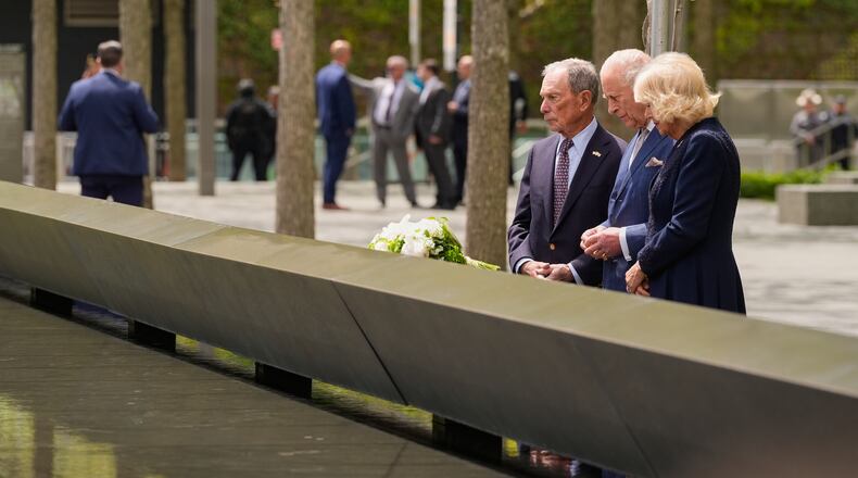 Former New York City mayor Michael Bloomberg, from left, Britain's King Charles III and Queen Camilla visit the 9/11 Memorial, Wednesday, April 29, 2026, in New York. (AP Photo/Seth Wenig)