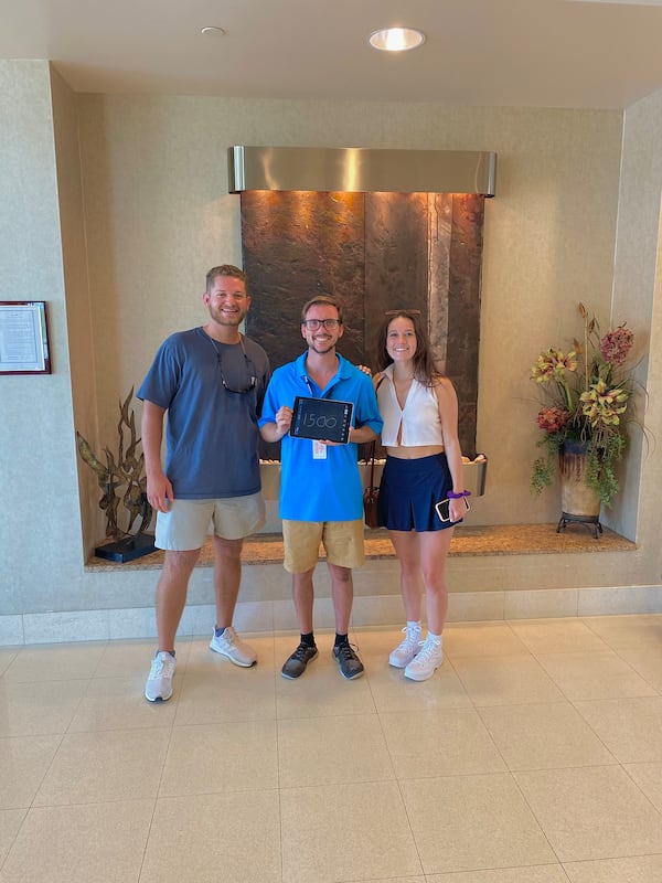 Left to right: William Moore, Sam Lilley and Kaitlin Sells pose for a photo to celebrate Sam Lilley reaching the 1,500 flight hours required to become an airline pilot with a flight in Savannah, Georgia in August 2022. Source: Kaitlin Sells