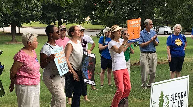 Nearly 100 people came together at Cleopas R. Johnson Park, located on Atlanta Student Movement Boulevard, not far from the Atlanta University Center, for the city’s version of the international “Rise for Climate” protests. The rallies were organized in support of a summit scheduled next week in San Francisco. (Photo: TYLER ESTEP / TYLER.ESTEP@AJC.COM)