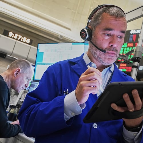 Options trader Justin Kanda works on the floor of the New York Stock Exchange, Thursday, May 7, 2026. (AP Photo/Richard Drew)