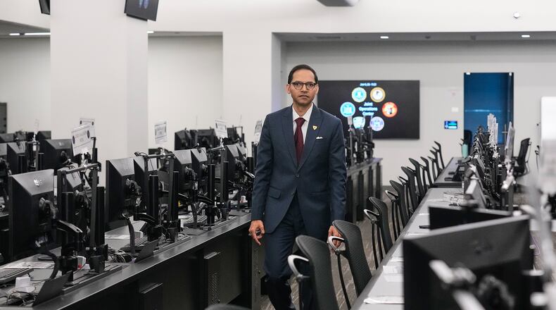 FBI Special Agent in Charge Amit Kachhia-Patel, Mission Services Division, walks through a portion of the agency's Joint Operations Center in New York, Thursday, June 4, 2026, ahead of the World Cup soccer tournament. (AP Photo/Richard Drew)