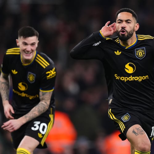 Manchester United's Matheus Cunha celebrates scoring their side's third goal of the game during the English Premier League soccer match between Arsenal and Manchester United in London, Sunday, Jan. 25, 2026. (Mike Egerton/PA via AP)