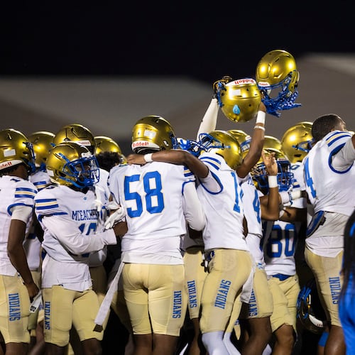 McEachern players celebrate their victory against Hillgrove at Cobb Energy Hillgrove Stadium in Powder Springs on Friday, Oct. 17, 2025. (Oscar Guevara Saenz for the AJC)