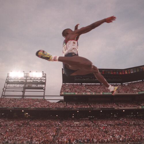 35-year-old Carl Lewis soared to the gold medal in the long jump at the 1996 Olympics in Atlanta. Lewis also won the event in the 1984, 1988 and 1992 Games. (Rich Addicks/AJC 1996)