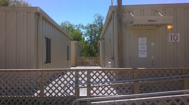 The trailers at Harmony Leland Elementary School in Mableton are the subject of complaints from many parents due to overcrowded conditions. Cobb County school officials propose constructing a replacement Harmony Leland Elementary School with funds from a Special Purpose Local Option Sales Tax if it passes on March 21. AJC File Photo