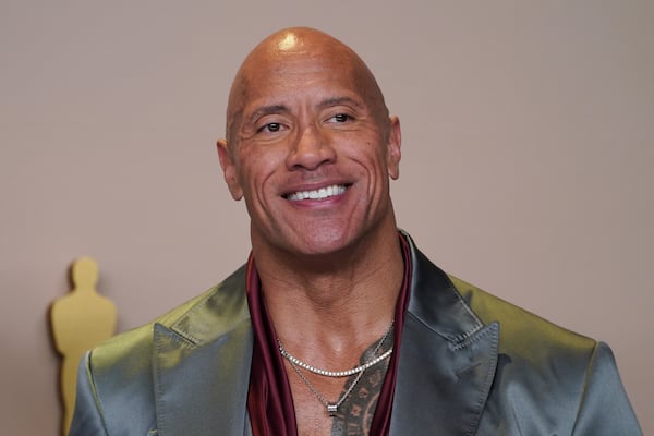 Dwayne "The Rock" Johnson poses in the press room at the Oscars on March 10, 2024, in Los Angeles. (Courtesy of Jordan Strauss/Invision/AP)