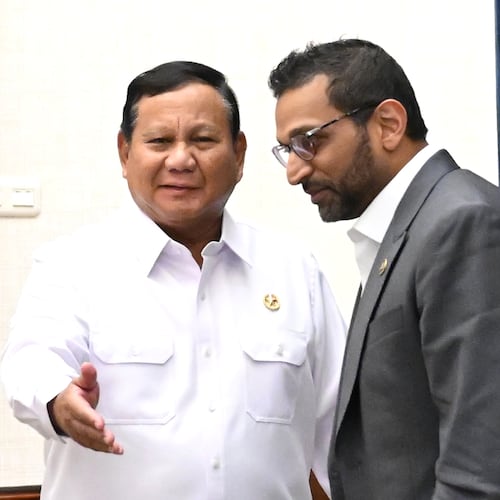 In this photo released by the Press, Media and Information Bureau of the Indonesian Presidential Secretariat, Indonesian President Prabowo Subianto, left, talks with FBI Director Kash Patel during their meeting in Jakarta, Indonesia, Wednesday, July 22, 2026. (Indonesian Presidential Secretariat via AP)