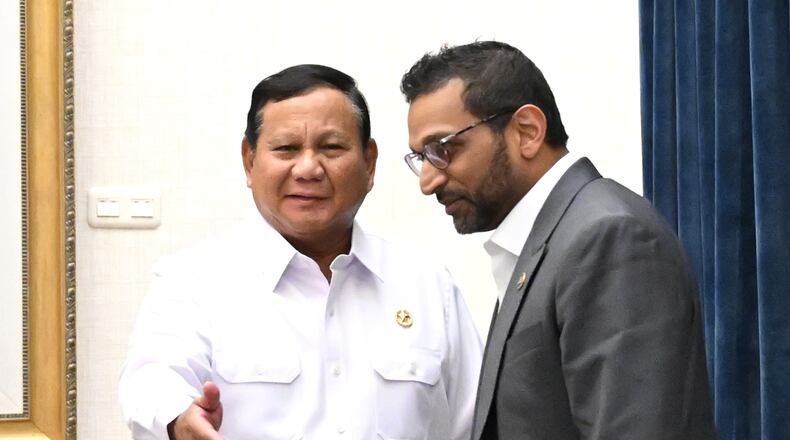 In this photo released by the Press, Media and Information Bureau of the Indonesian Presidential Secretariat, Indonesian President Prabowo Subianto, left, talks with FBI Director Kash Patel during their meeting in Jakarta, Indonesia, Wednesday, July 22, 2026. (Indonesian Presidential Secretariat via AP)