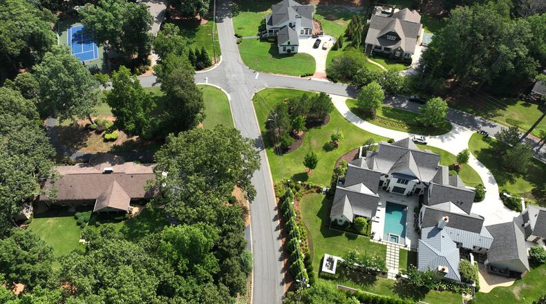 Aerial view of residential properties on Saint Marys Lane in Marietta on Wednesday, July 6, 2022. In Cobb County, the tax assessments for more than 68% of all residential properties will go up this year, which is expected to lead to higher tax bills for more than 166,000 property owners. (Hyosub Shin / Hyosub.Shin@ajc.com)