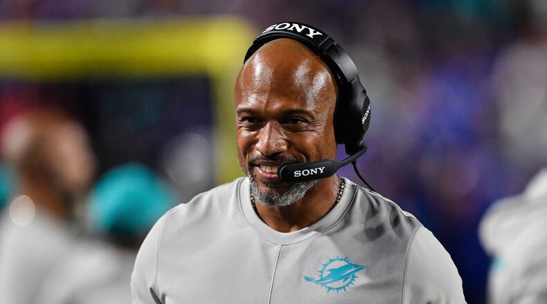 FILE - Miami Dolphins defensive coordinator Anthony Weaver walks on the sideline during the second half of an NFL football game against the Buffalo Bills, Thursday, Sept. 18, 2025, in Orchard Park, N.Y. (AP Photo/Adrian Kraus, File)