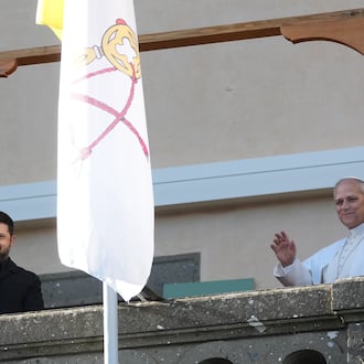 Ukraine's President Volodymyr Zelenskyy and Pope Leo XIV wave to journalists during their meeting in Castel Gandolfo, Italy, Tuesday, Dec. 9, 2025. (AP Photo/Andrew Medichini)