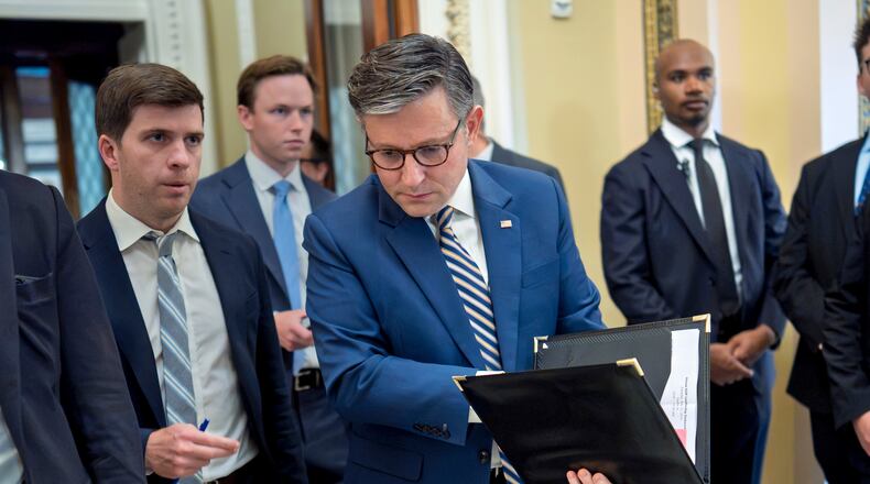 Speaker of the House Mike Johnson, R-La., leaves the chamber as members debate a series of measures including a continuing resolution to fund the government and a spending package for the Iran war, at the Capitol in Washington, Tuesday, July 21, 2026. (AP Photo/J. Scott Applewhite)