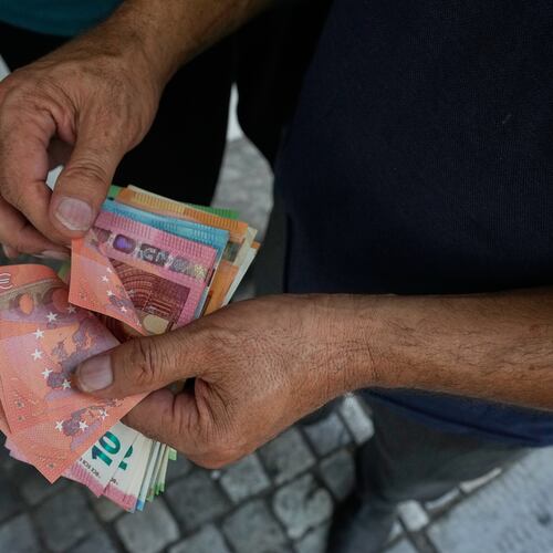 A money exchanger counts Euro bank notes at Ferdowsi square, Tehran's go-to venue for foreign currency exchange, in downtown Tehran, Iran, Monday, Aug. 24, 2026. AP Photo/Vahid Salemi)