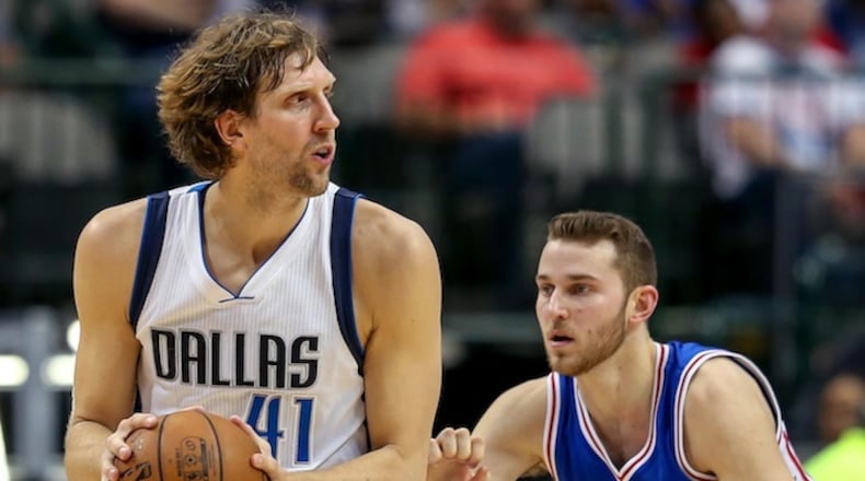 Dallas Mavericks forward Dirk Nowitzki (41) looks to pass against Philadelphia 76ers guard Nik Stauskas (11) during the second half on Wednesday, Feb. 1, 2017 at the American Airlines Center in Dallas, Texas. (Steve Nurenberg/Fort Worth Star-Telegram/TNS)