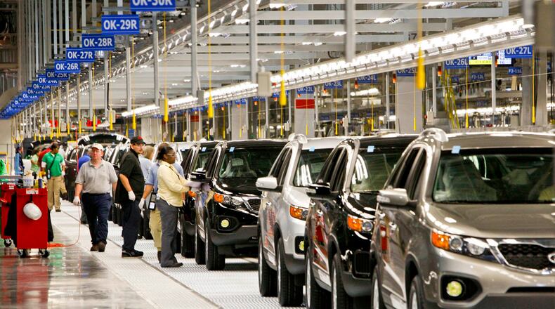 2011 Kia Sorento vehicles travel along the assembly line in a Kia automobile manufacturing facility in West Point, Ga. Kia Motors via Bloomberg