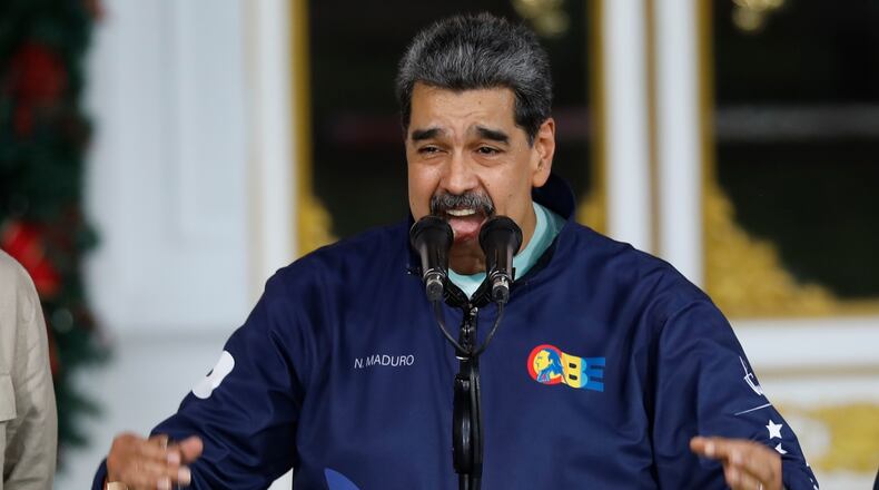Venezuelan President Nicolas speaks during a Student Day event at the Miraflores presidential palace in Caracas, Venezuela, Friday, Nov. 21, 2025. (AP Photo/Cristian Hernandez)