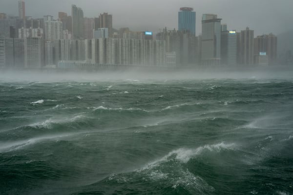 Waves are seen near the Victoria Harbor following the Typhoon Wipha, in Hong Kong, Sunday, July 20, 2025. (AP Photo/Vernon Yuen)