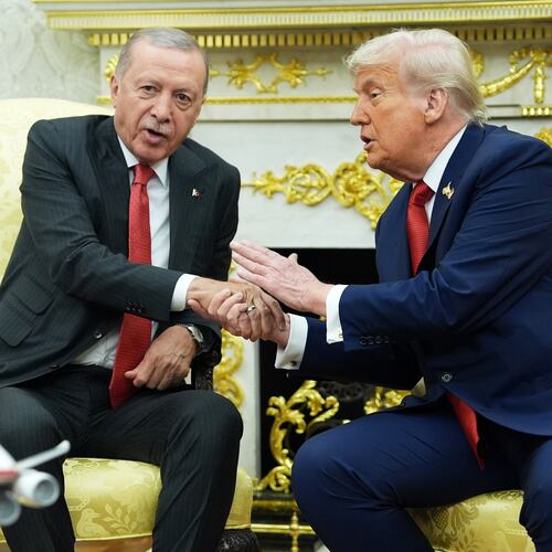 FILE - President Donald Trump, right, shakes hands with Turkish President Recep Tayyip Erdogan during a meeting in the Oval Office of the White House, Sept. 25, 2025, in Washington. (AP Photo/Evan Vucci, File)