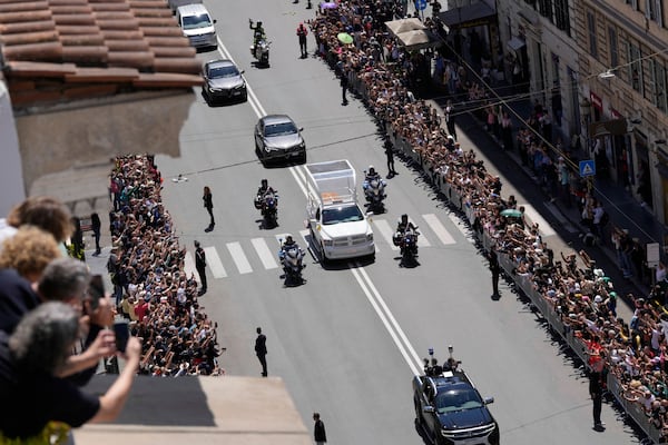 The coffin of Pope Francis makes its way to St. Mary Major Basilica in Rome, Saturday, April 26, 2025. (AP Photo/Luca Bruno)