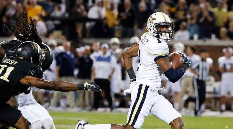 Georgia Tech's Qua Searcy, right, runs for a touchdown in the third quarter of an NCAA college football game against Wake Forest in Atlanta, Saturday, Oct. 21, 2017. (AP Photo/David Goldman)