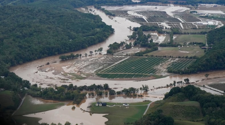 FILE - An aerial view of flood damage left in the aftermath of Hurricane Helene is seen Sept. 28, 2024, in Greene County, Tenn. (AP Photo/George Walker IV, File)