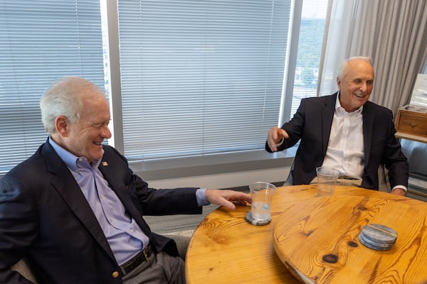 Today, Rick Bennett (left) and Ken Thrasher still have offices at the firm they founded in 1980. “We wanted to raise our families in Atlanta,” Bennett says. (Arvin Temkar/AJC)