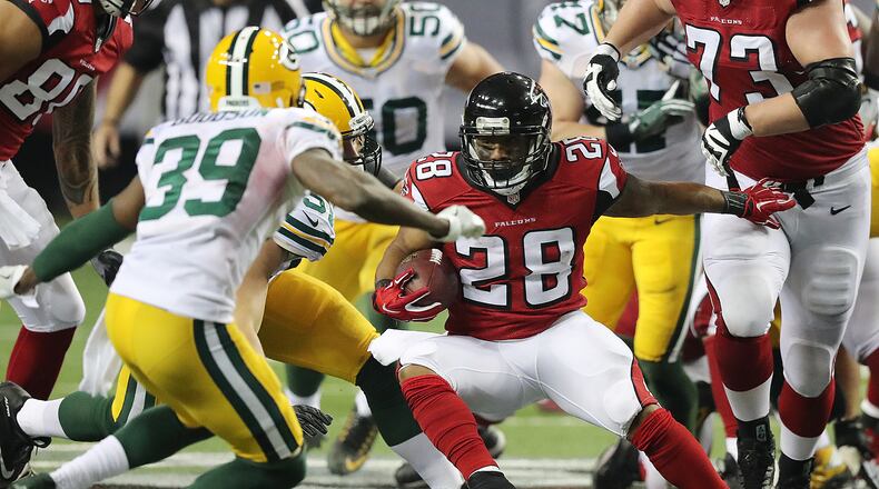 October 30, 2016 ATLANTA: Falcons running back Terron Ward picks up a first down against the Packers during the second half in an NFL football game on Sunday, Oct. 30, 2016, in Atlanta. Curtis Compton /ccompton@ajc.com