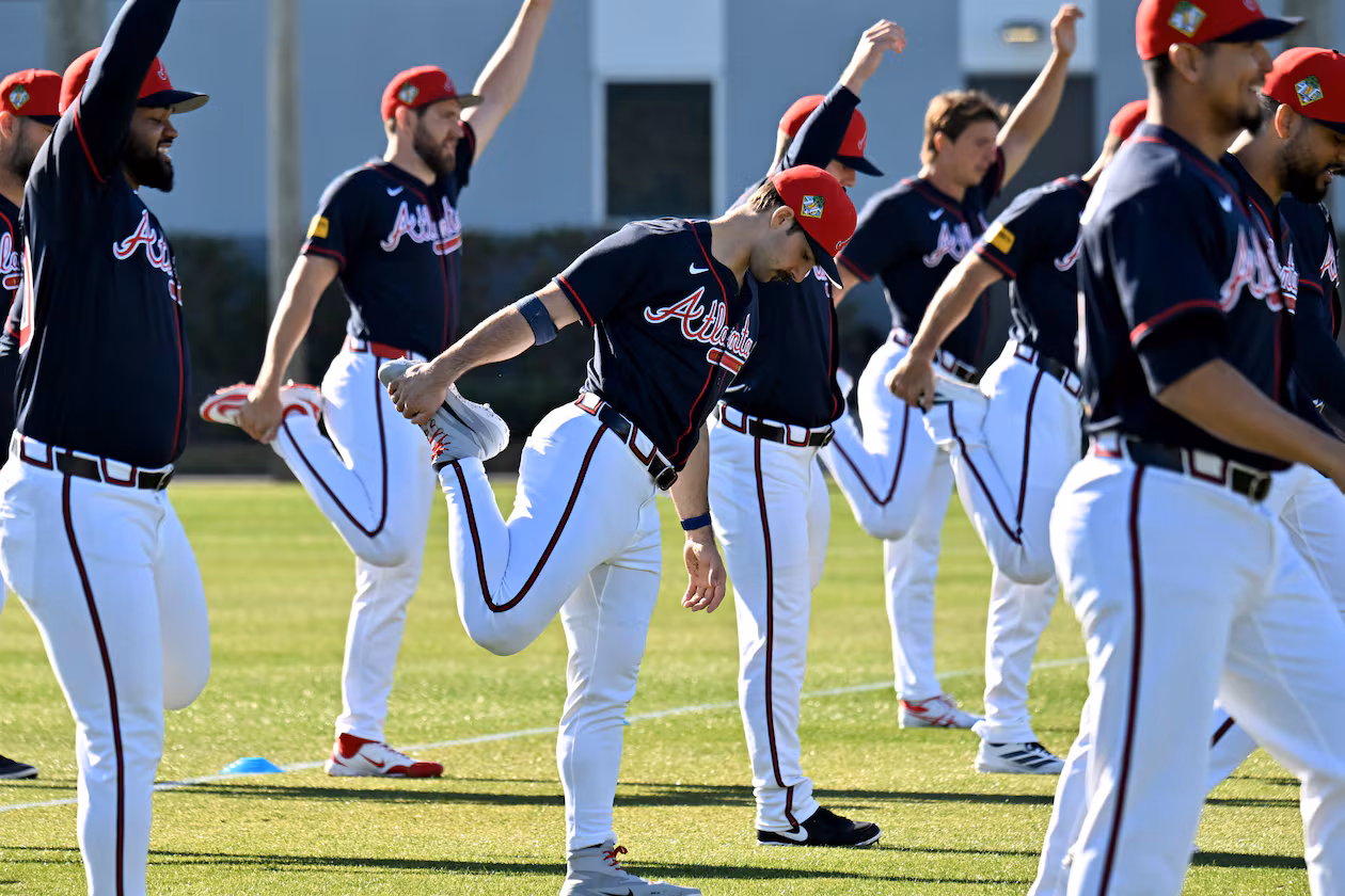 Braves pitcher Spencer Strider (center) — pictured during pitcher and catcher workouts in February — left his start Friday with right elbow and shoulder discomfort. After being evaluated Monday, Strider will be shut down for a month then reevaluated. (Hyosub Shin/AJC)