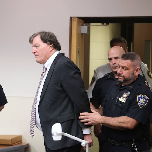 FILE - Alleged Gilgo serial killer Rex Heuermann is led into courtroom for a Frye hearing at Suffolk County Court in Riverhead, N.Y., April 3, 2025. (James Carbone/Newsday via AP, File)