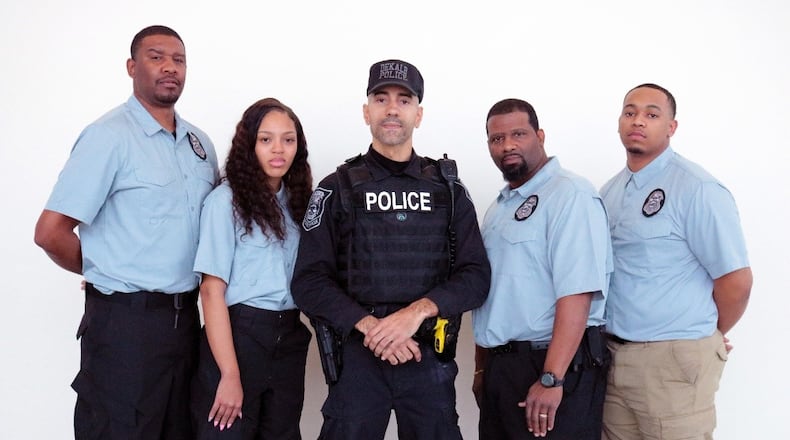 New DeKalb County park rangers and their supervisor: (left to right) Carlos McNair, Kenyetta Broughton, Officer Jean-Jacques Lambotte, Curtis Carter and Rashad Bridges. Handout: DeKalb County