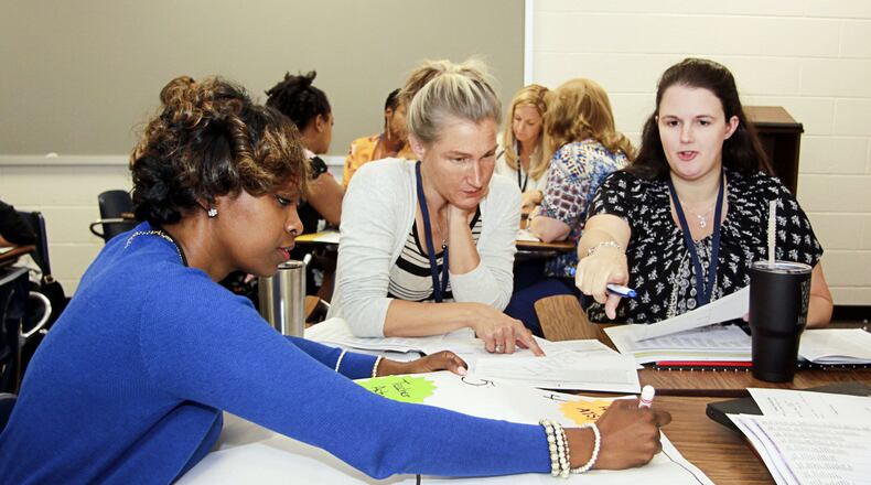 Gwinnett County Public School teachers take part in a professional development exercise earlier this year. The school district made the Forbes list of Best Employers for Women for the second year in a row. Although 78% of its 23,000 employees are women, employment experts say it’s more than numbers that make a workplace a good fit for women. Employers need to offer support and upward mobility. COURTESY OF GWINNETT COUNTY PUBLIC SCHOOLS