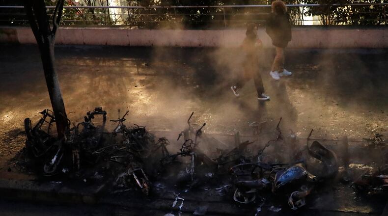 Charred vehicles are pictured after a fire near the Gare de Lyon train station in Paris.