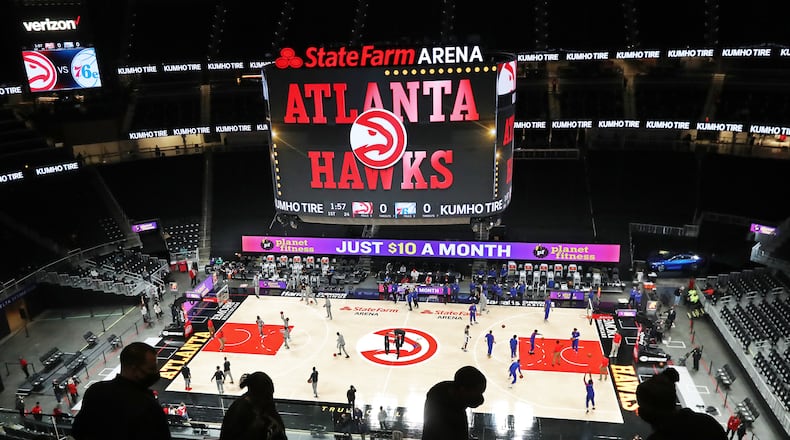 A few fans arrive to watch the Atlanta Hawks play the Philadelphia 76ers Monday, Jan. 11, 2021, at State Farm Arena in Atlanta.  (Curtis Compton / Curtis.Compton@ajc.com)