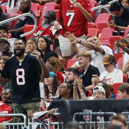 Atlanta Falcons fans react after an interception from Atlanta Falcons quarterback Jack Strand in the second half of an NFL game against the Carolina Panthers at Mercedes-Benz Stadium in Atlanta on Sunday, Sept. 20, 2026. (Miguel Martinez/AJC)